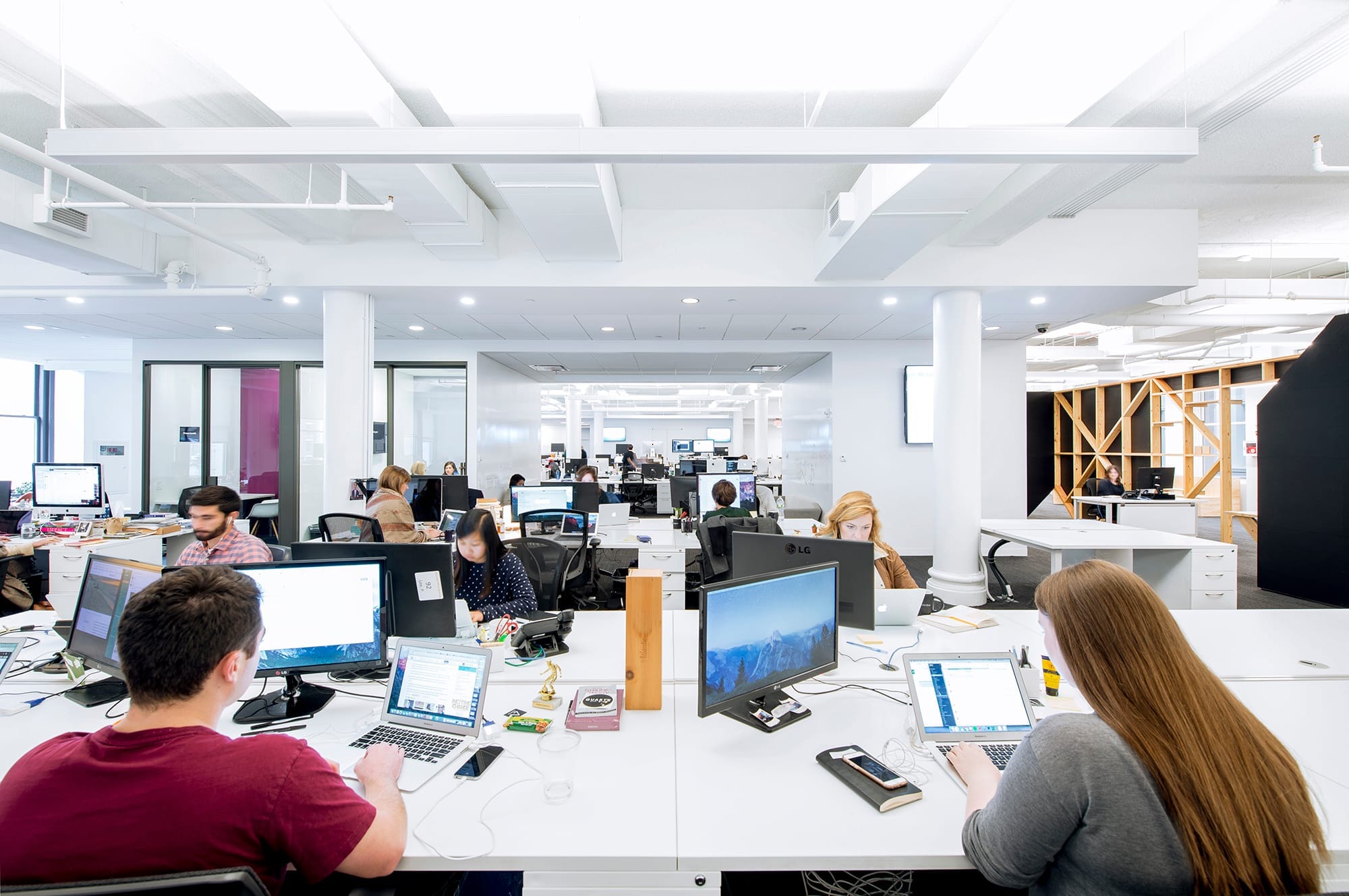 Modern office space with developers working collaboratively